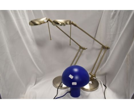 A pair of modern adjustable desk top brushed steel lamps and a glass mushroom lamp.