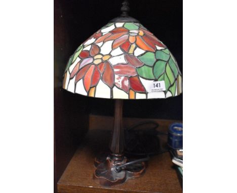 A modern Tiffany style lamp with a leaded light shade