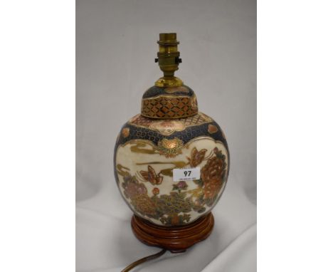 A modern Chinese style table lamp in the form of a ginger jar.