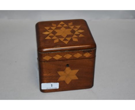 An Edwardian Mahogany tea caddy with inlaid geometric marquetry