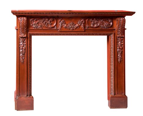 A FINE GEORGIAN STYLE MAHOGANY CARVED MOULDED MANTEL PIECE. With egg anddart mound shelf, above a frieze with scrolling folia