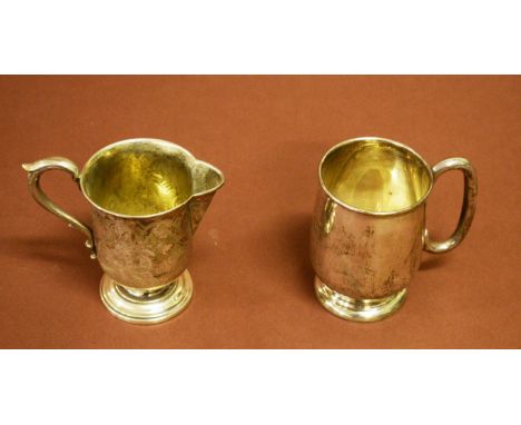 A VICTORIAN SILVER CREAM JUG, with scroll handle and stem base. Together with an earlytwentieth century Sheffield silver chri
