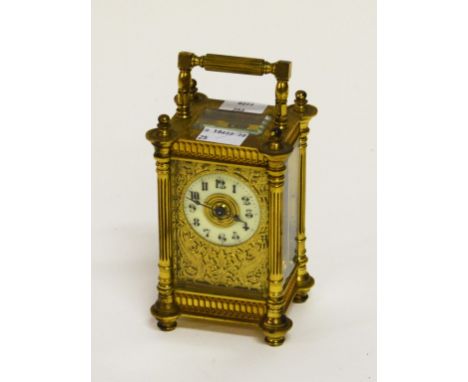 A GOOD FRENCH BRASS FIVE GLASS CARRIAGE CLOCK. By R. and Company Paris. Withreeded swing handle, each corner with fluted pila