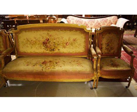 A GOOD LOUIS XVI STYLE FIVE-PIECE GILT SUITE OF SEAT FURNITURE. c.1900.Comprising a three-seater settee, with guilloche and b