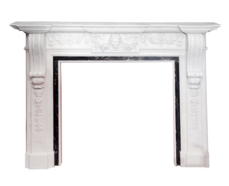 A FINE LARGE GEORGIAN STYLE CARVED WHITE MARBLE MANTLE PIECE. With triplebreakfront shelf above a central tablet. Female mask