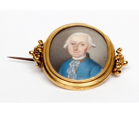 AN EIGHTEENTH CENTURY MINIATURE PORTRAIT. Depicting a gentleman wearing a whitewig with blue lace trimmed jacket. On ivory wi