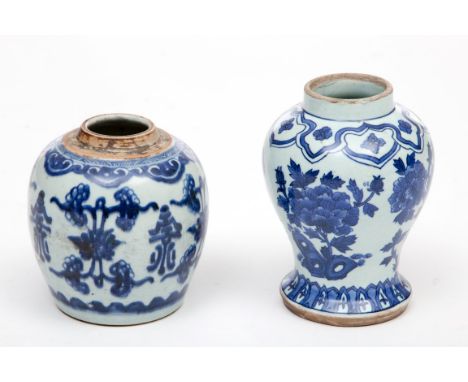 A HEAVY NINETEENTH CENTURY CHINESE BALUSTER SHAPED BLUE AND WHITEPORCELAIN JAR. Floral decoration and red seal mark to base. 