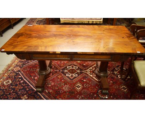 AN EARLY VICTORIAN MAHOGANY AND CROSSBANDED CENTRE OR SOFA TABLE.Rectangular top with rounded corners above two frieze drawer