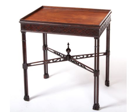 A GEORGE III STYLE (EARLY TWENTIETH CENTURY) RECTANGULAR MAHOGANY SILVERTABLE. With all round gallery, above a pierced blind 