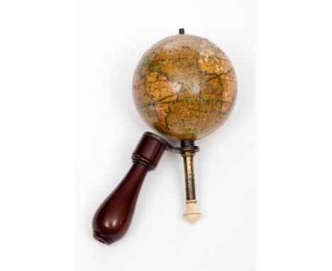 A RARE NEWTON’S NEW TERRESTRIAL POCKET GLOBE. 1818. Late George III.2" (5cm)high. Ivory mounted brass turning pin and turned 