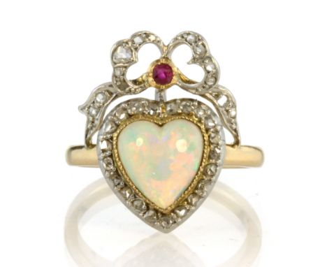 An antique late 19th Century opal, ruby and diamond sweetheart ring in high carat yellow gold with French assay marks, design