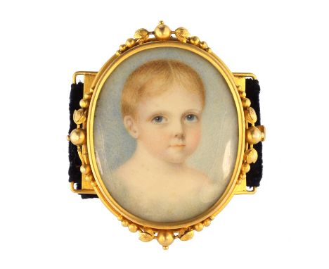 An antique portrait miniature clasp in 18ct yellow gold of oval form, depicting a very young girl, set within an 18ct gold mo