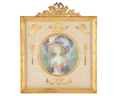 Continental School (19th century):An elaborate gilt metal frame with cherub & torch design, inset with a portrait miniature o