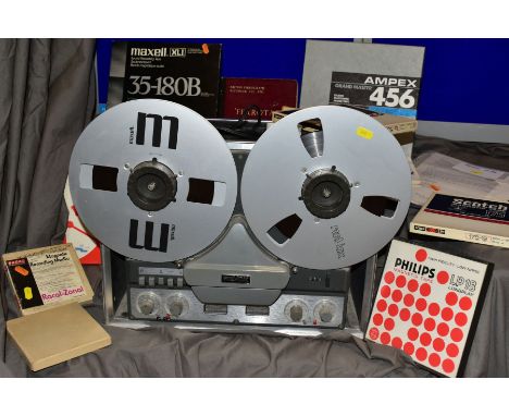 A REVOX G636 REEL TO REEL PLAYER serial No 76067 with 12 spare tape reels, receipt from 1988 for repair and restoration ( PAT