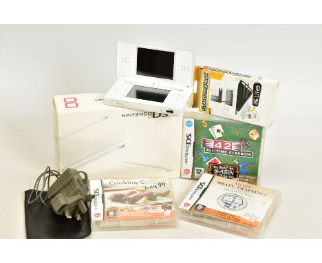 A WHITE DS LITE, complete with box, charger, starter pack, More Brain Training From Doctor Kawashima boxed, Cooking Guide box