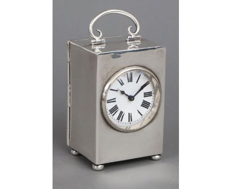 ¨Carriage clock¨, England um 1900 (verschlagene Punzen), eckiges Gehäuse mit beweglichem Bügelgriff auf 4 Kugelfüßen, rundes 