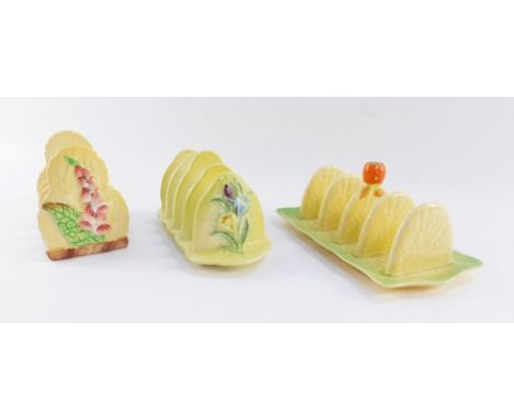 Three ceramic toast racks, comprising Carltonware tomato rack, Carltonware foxgloves toast rack, and a Beswick tulip rack, th