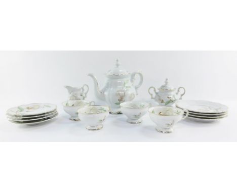 An Hutschenreuther porcelain Sylvia pattern part tea service, printed marks, comprising four tea pot, cream jug, sucrier, fou