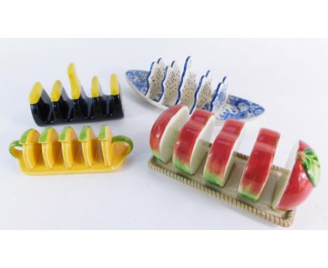 Four various toast racks, comprising an early 19thC Spode Botanical blue and white four division toast rack, 26cm long, a Car