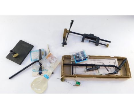 Three fly tying vices, and accessories to include bobbin holders, scissors, etc. (1 tray)