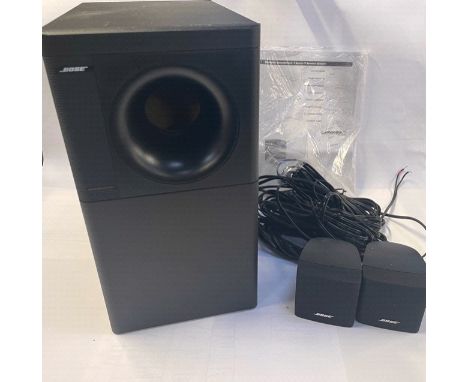 A Bose Acoustic Mass system speaker, 3 Series IV, serial no 024303333510569AC, and two additional smaller speakers, 36cm high