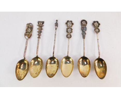 Six Chinese silver spoons, each with bamboo effect shaft and differing terminals, to include buildings, Chinese figures, drag