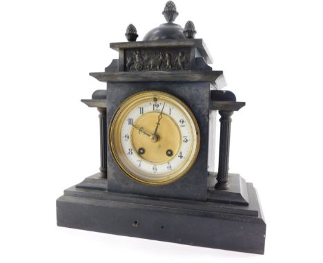 A 19thC black slate mantel clock, the brass circular brass dial with white enamel chapter ring bearing Arabic numerals, Hambu