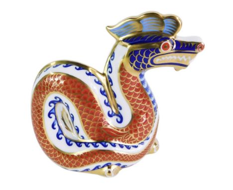 A Royal Crown Derby dragon paperweight, gold stopper, 11.5cm high, boxed.