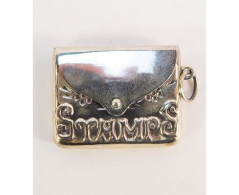 A silver cased stamp case fob pendant, of envelope form, embossed 'Stamps', with floral engraving, chain ring attachment, mar