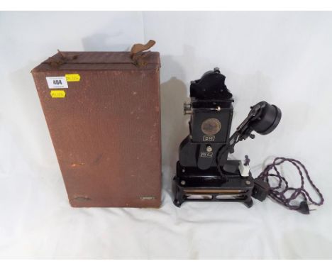 A vintage cased Pathe PB-EX 22
