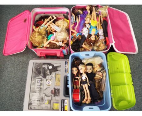 Two child's suitcases, a micro science microscope set and a large quantity of child's dolls