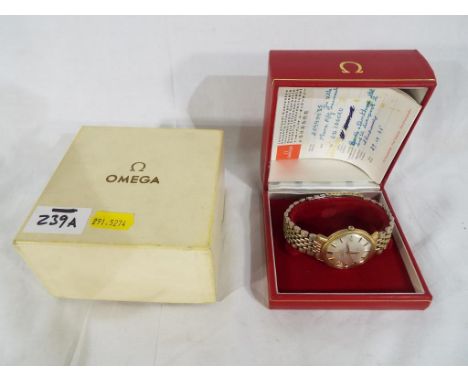 A gentleman's vintage Omega Constellation automatic wristwatch with box and outer casing. Estimate £60 - £80