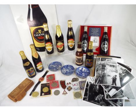 Guinness - a small collection of Guinness memorabilia to include photographs of the factory, etc, poster, vintage and commemo