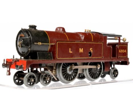 A HORNBY O-GAUGE 4-4-2 CLOCKWORK LOCOMOTIVE IN LMS LIVERY NUMBER 6954