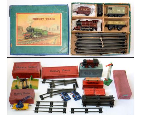 A HORNBY O-GAUGE CLOCKWORK TRAIN SET, INCLUDING LMS 0-4-0 LOCOMOTIVE AND TENDER, BOXED AND FURTHER BOXED HORNBY O-GAUGE ITEMS