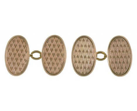 A PAIR OF 9CT GOLD ENGINE TURNED OVAL CUFFLINKS, 9.5G
