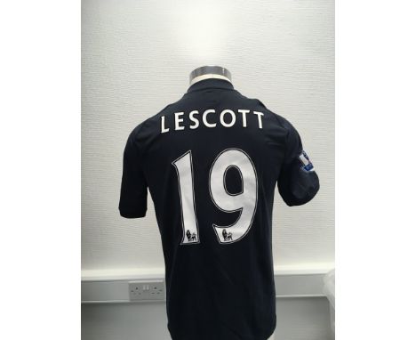 Manchester City 2010 - 2011 Match Worn Football Shirt: Away short sleeve number 19 with Premier League badging to arms. Worn 