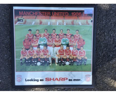 Manchester United Large Framed Signed Poster: The 86/87 team group with Sharp advertising signed by Matt Busby Bobby Charlton