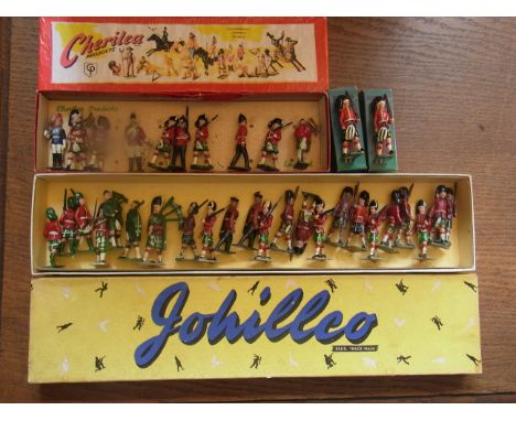 A box of Johillco Lead Soldiers twenty three Scots Soldiers, two Britains Gordon Highlanders in preview order marching, a box