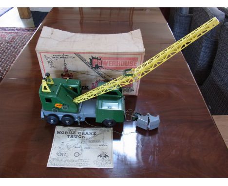 A Lous Marx Mobile Crane Truck, finished in green and yellow tinplate with original box
