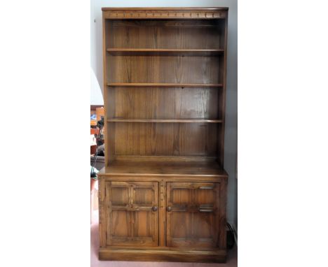 Ercol mid 20th century oak open bookcase with single drawer below. Approx. 196 x 98 x 50cms

reasonable used condition with m