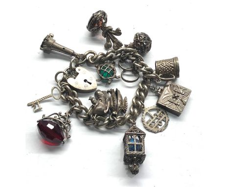 Vintage 925 sterling silver charm bracelet with opening, stone set charms (86g)