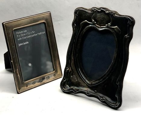 2 Vintage silver picture frames largest measures approx 20cm by 15cm and 16cm by 12.5cm 