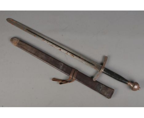 A sword with leather wrapped handle, fullered blade and leather scabbard. Length of blade (71cm) CANNOT POST OVERSEAS  Sword 