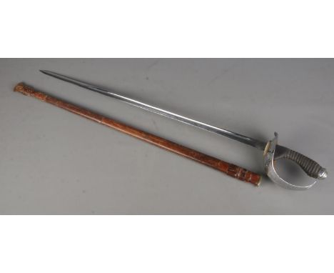 A 1912 pattern cavalry officers sword with leather scabbard. Length of blade 87cm. CANNOT POST OVERSEAS  