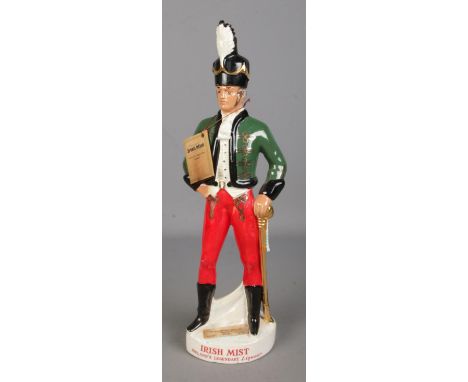 A large Irish Mist ceramic decanter formed as an Irish Soldier in the Brigade-Austrian Army. Approx. height 49cm.  