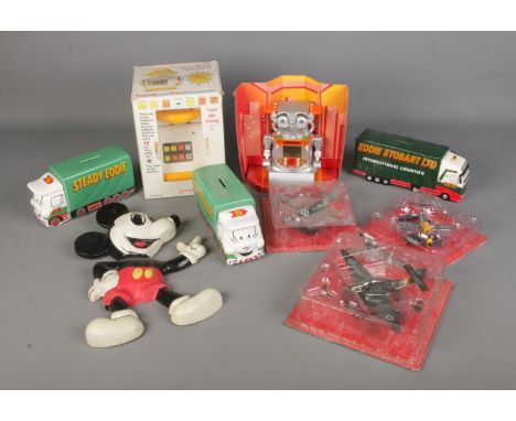 A collection of mostly children's toys and collectables to include two Wade Steady Eddie money banks, vintage Disney Mickey M
