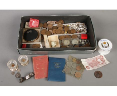 A tray of collectables. Includes pair of silver base tealight holders, silver St Christopher pendant, coins, compact, etc.  