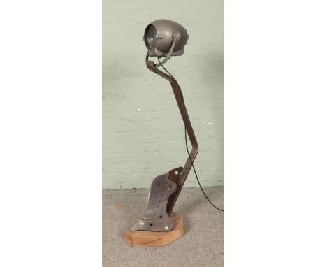 A vintage Strand Patt 123 theatre light on bespoke stand.  