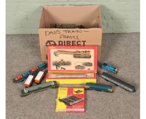 A box of 00 gauge railway. Includes Hornby 75 Ton Breakdown Crane R6204, track, Lima carriages, Hornby Thomas The Tank Engine